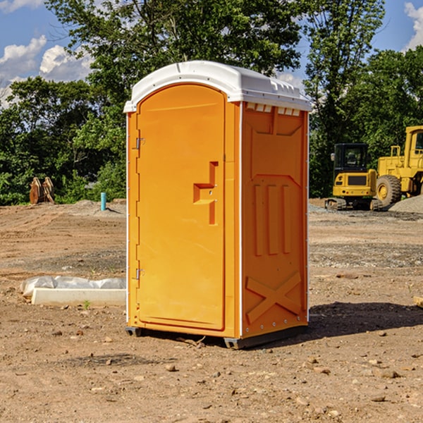 how often are the porta potties cleaned and serviced during a rental period in Bedford